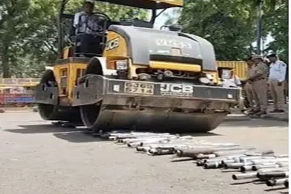Bulldozer-on-bike-silencer.jpg